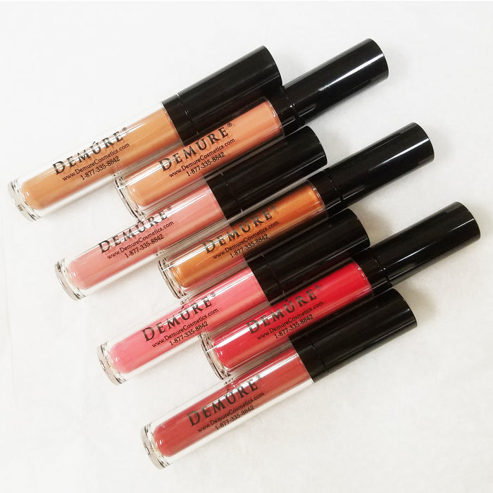 Set of Demure Matte Lipsticks in various colors on a white background