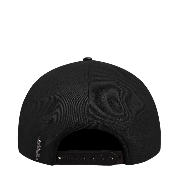 Black snapback cap back view with adjustable strap and ventilation eyelets