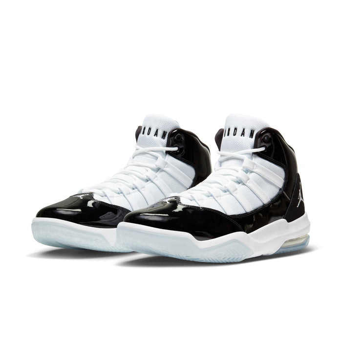 High-top basketball shoes in black and white, lace-up design with Jumpman logo