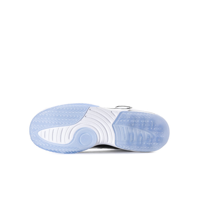 Youth sneaker outsole view with light blue rubber tread and white traction grooves