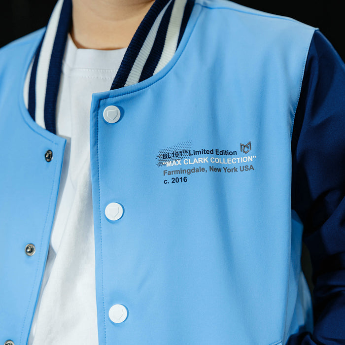 Youth model wearing blue Max Clark Bomber youth bomber