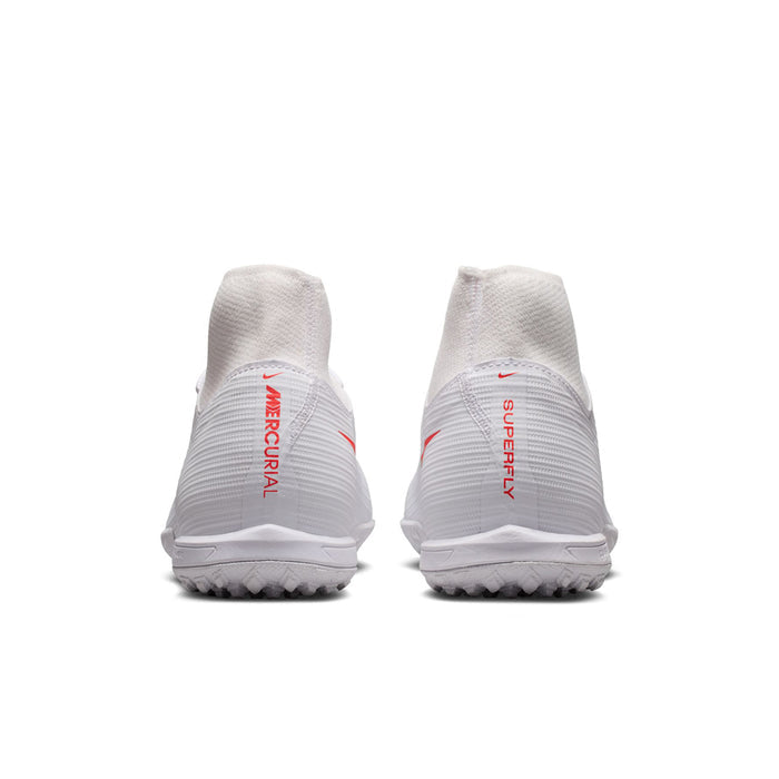 Men's white Nike turf soccer cleats with textured heel and red branding on back