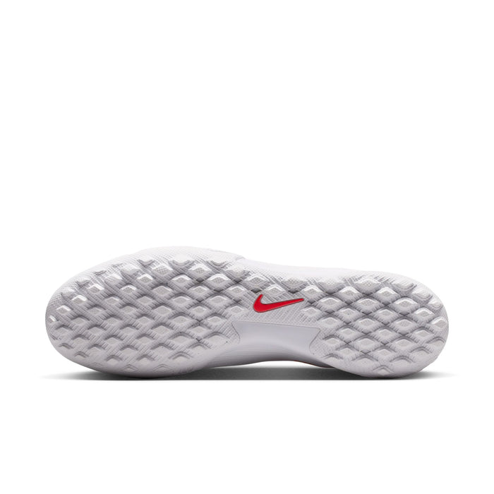 Men's white Nike turf soccer cleat outsole with gray stud pattern and red swoosh