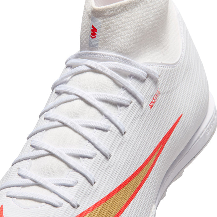 White Nike turf soccer cleat upper with lace-up front and small red swoosh logo
