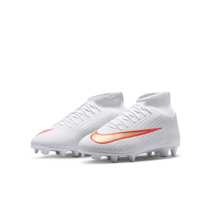 Youth soccer cleats, side view, white knit upper with orange Nike swoosh