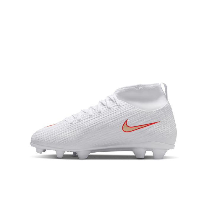 Youth soccer cleats, front angle, white upper with orange Nike swoosh and studs