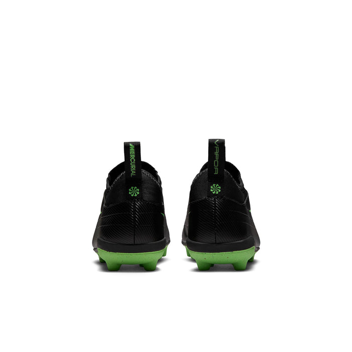 Kids black cleats rear view with green heel accents and molded studs
