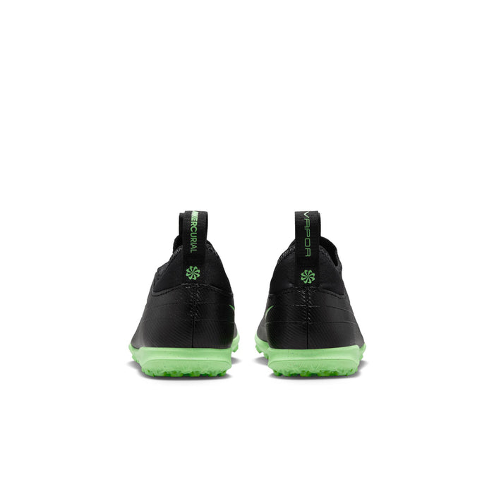 Kids black soccer cleats with green heel pull tabs, padded back, turf outsole