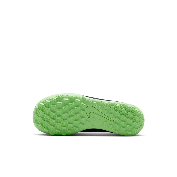 Kids soccer cleats outsole in dark and bright green with molded turf tread