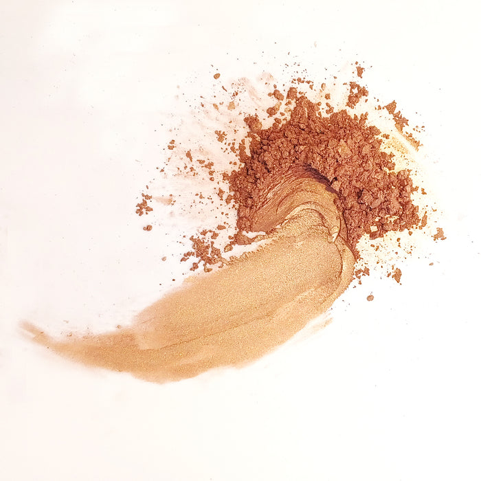 A swatch of Demure Face & Body Bronzer