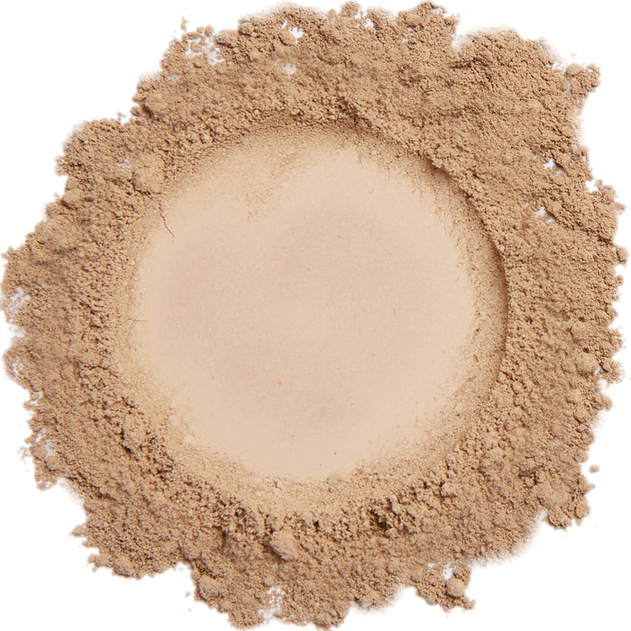 A close up swatch of Demure Medium Dark mineral foundation