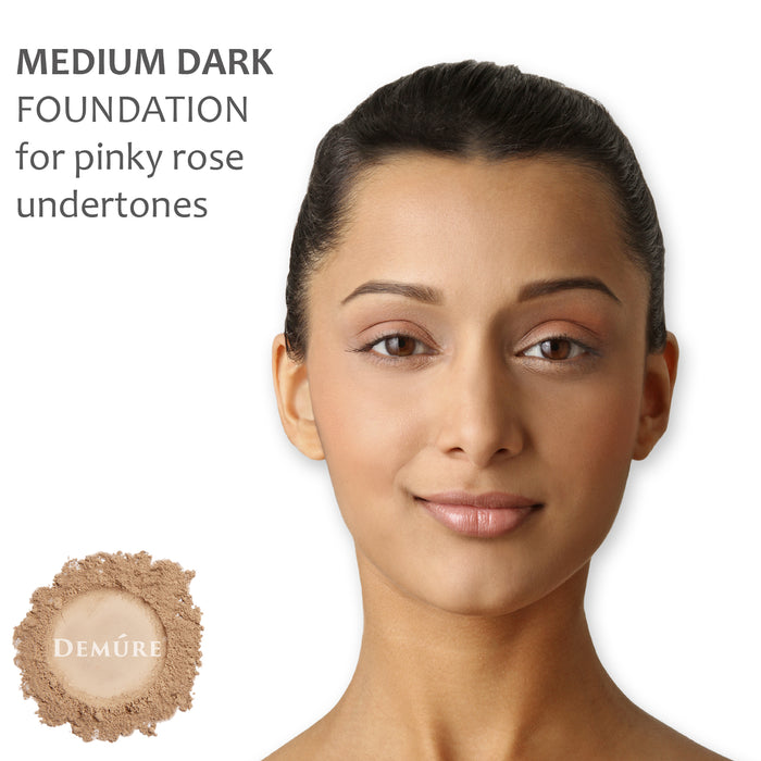 A woman wearing Demure Medium Dark foundation