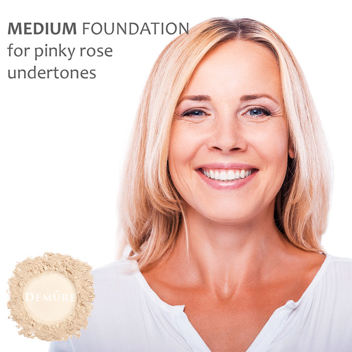 A woman wearing Demure Medium foundation for pinky rose undertones