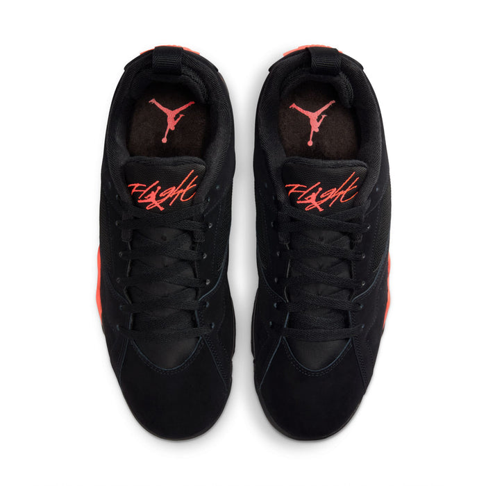 Pair of black low-top sneakers with red-orange logo on tongue, lace-up design