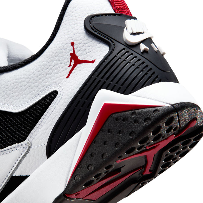 Men's basketball sneaker side close-up, red-and-black sole with Jordan logo
