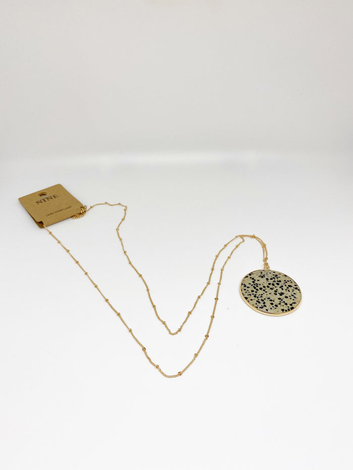 Nine Tan Circle Pendant Necklace