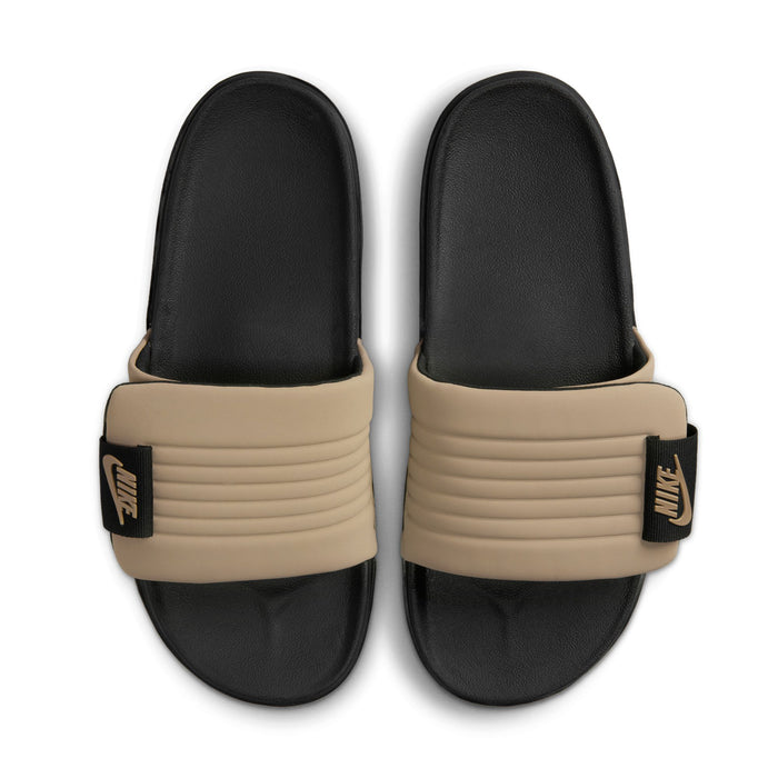 Pair of men's slide sandals with tan straps and black toe caps, featuring Nike logos