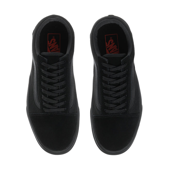 Men's black sneaker tongue and lace area with padded interior collar