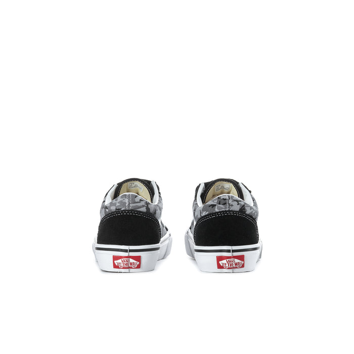 Kids black sneakers with gray camo heel, showing rear and white outsole