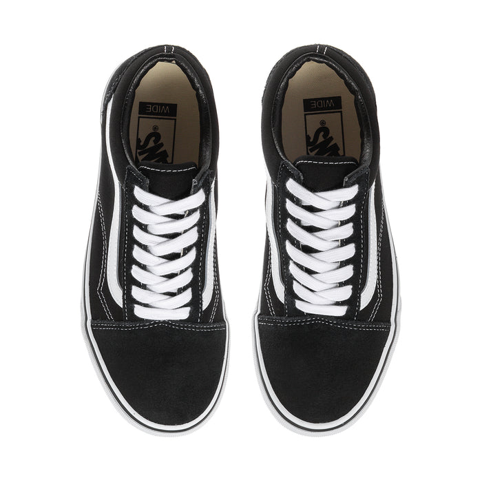 Pair of black low-top sneakers with white side stripes and white rubber cupsole
