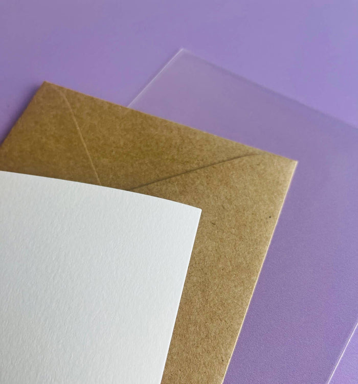 Close-up of a Crimson and Clover Studio One Year Closer card featuring elegant design and inspiring message on textured paper.