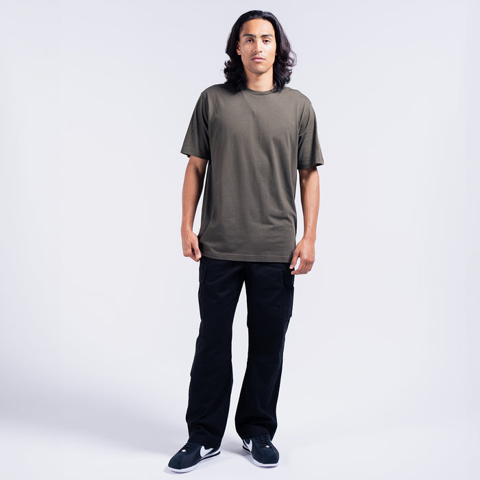 Men's dark open-hem cargo pants, angled side view with large cargo flap pockets