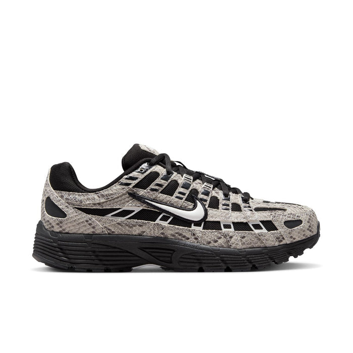Women’s athletic sneaker with snakeskin print, black accents, and cushioned sole