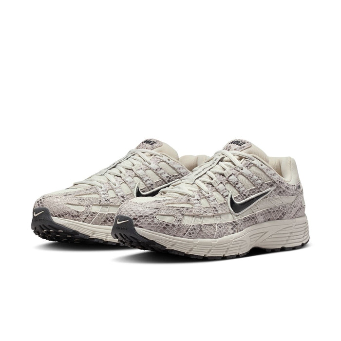 Women's Nike lace-up sneaker, light bone upper with gray snakeskin-texture and dark logo