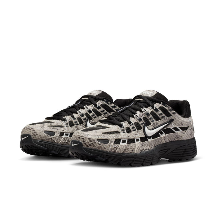 Women’s athletic sneaker, 3/4 view, snakeskin print with black laces and thick sole