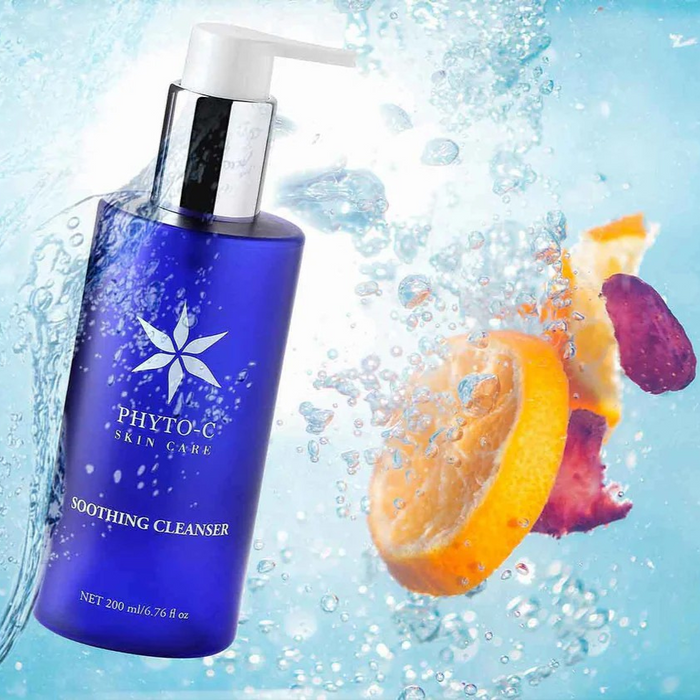 Phyto-C Soothing Cleanser blue pump bottle with citrus slices in water