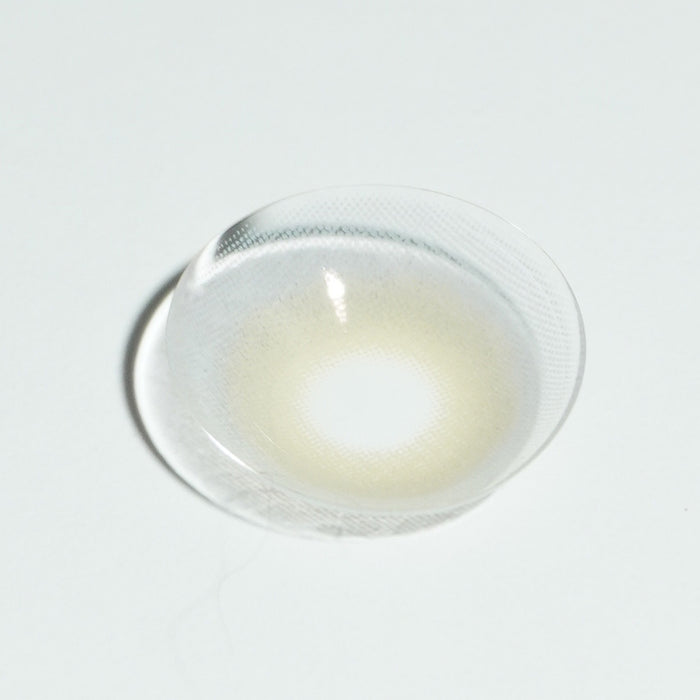 Macro shot of EyeCandys Pink Label Mykonos Grey colored contact lenses – soft grey prescription color contact lenses for a subtle yet striking eye transformation.