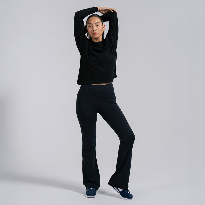 Black women’s flare leggings with high-rise waistband and flared bootcut legs