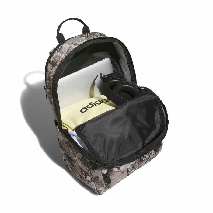 Camouflage backpack with open top and black interior pocket