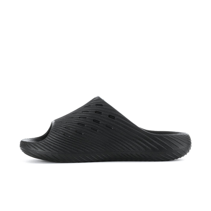 Men's black slide sandals with ridged footbed texture and slotted outsole