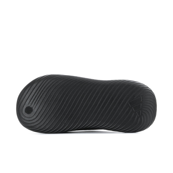 Men's black slide sandals outsole with curved tread lines for grip