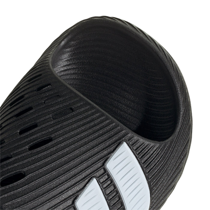 Black slide sandal upper with diagonal ridged texture and white stripe panel