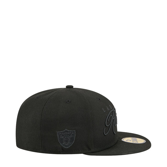 Black baseball cap with Raiders logo patch on the side and contrast brim