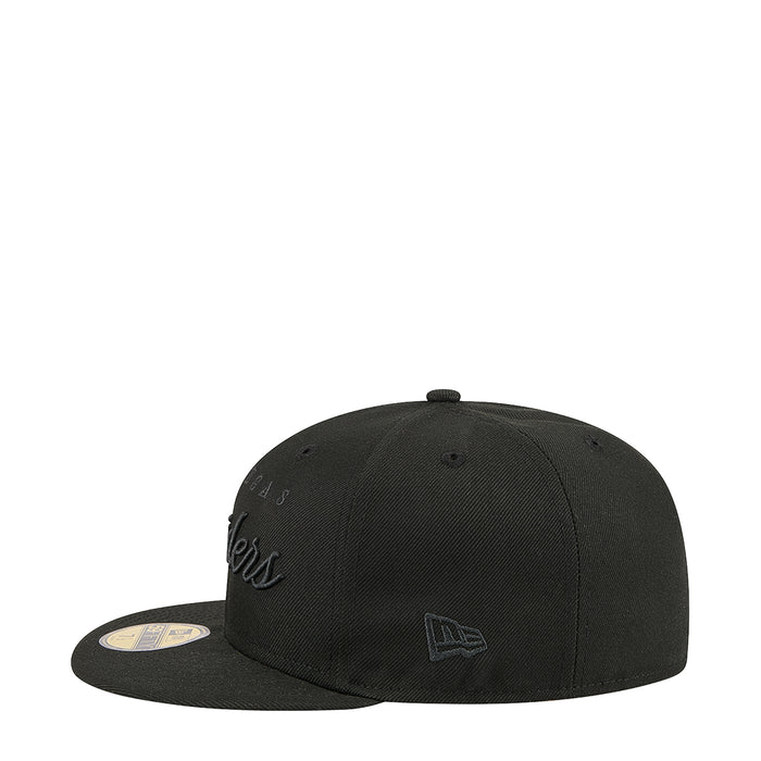 Black baseball cap with side Raiders script and small shield-style logo