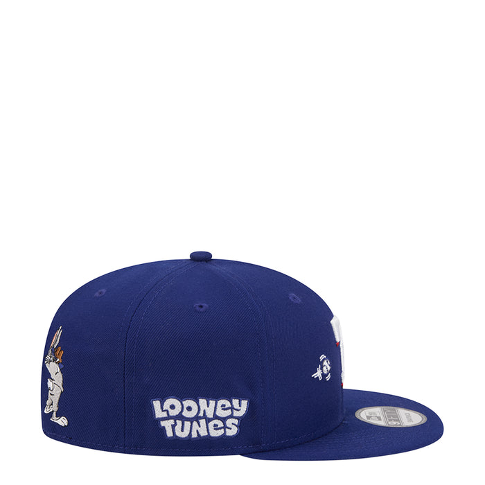 Blue baseball cap with Looney Tunes logo and small Bugs Bunny patches