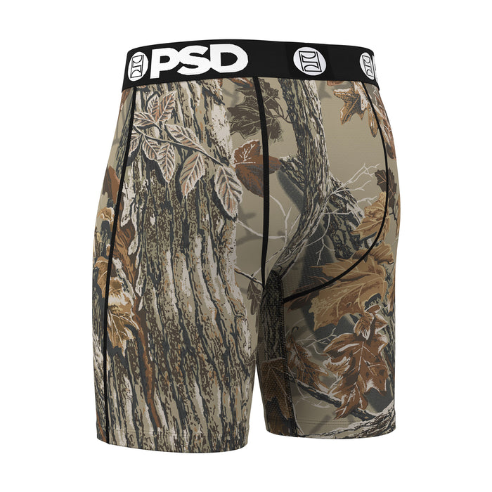 Men's camo boxer briefs, side view with tree-and-leaf pattern and black PSD waistband