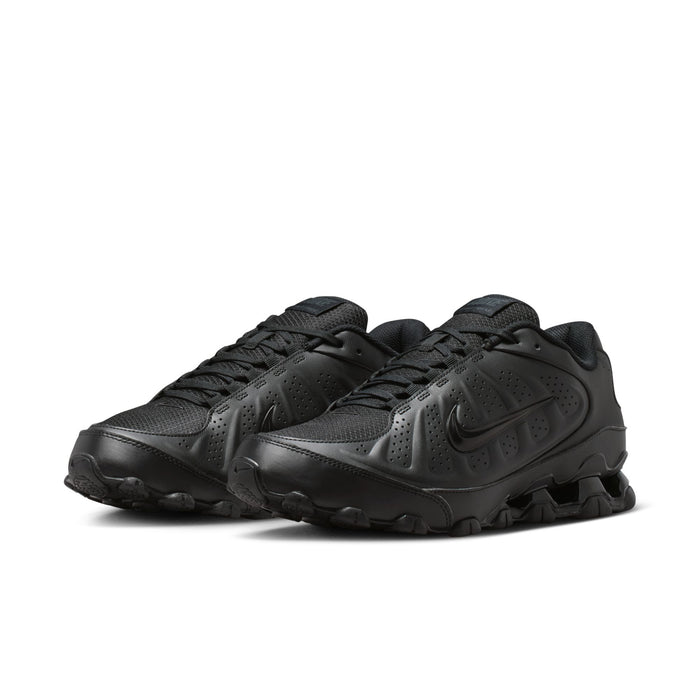 Men's black Nike athletic sneaker with dual swoosh details and rugged tread outsole