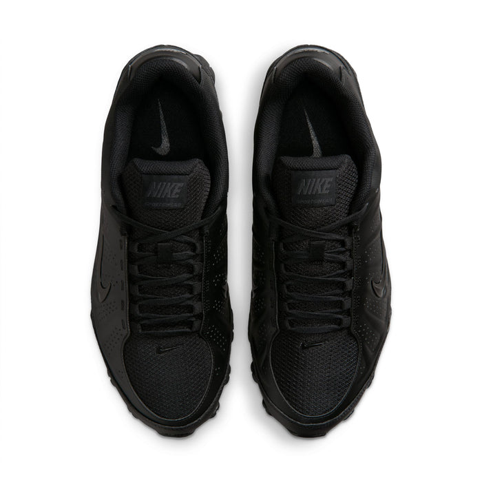 Men's black Nike sneakers with lace-up design, black tongue, and padded collar