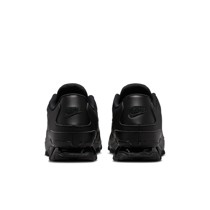 Men's black Nike sneakers with heel tabs and lace-up back view
