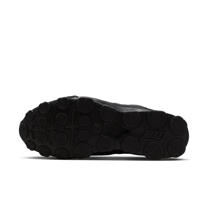 Men's black Nike sneaker outsole with circular traction tread