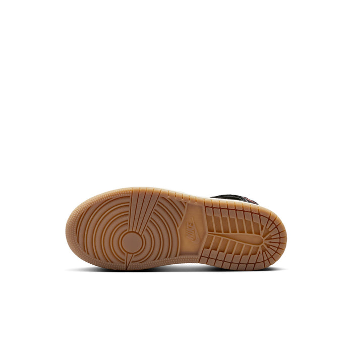 Kids high-top sneaker outsole with tan rubber tread and circular traction pattern