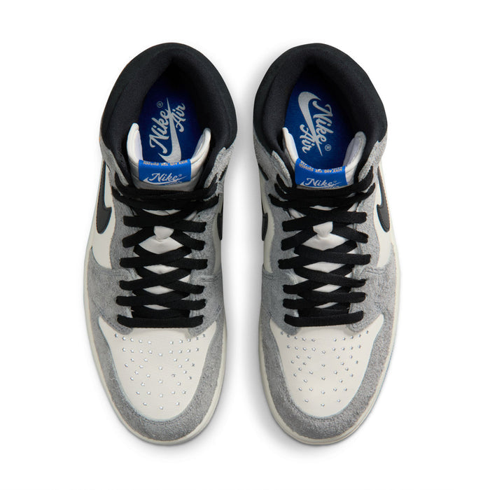 Mens high-top sneakers with black laces and white perforated toe panels on gray uppers