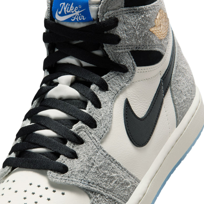 Close-up of mens high-top sneakers with black laces and gray suede over white leather
