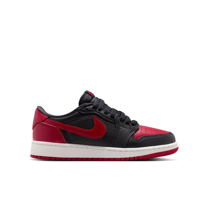 Youth low-top sneaker front view, black and red panels with red swoosh