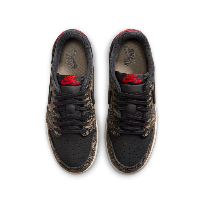 Youth low-top sneakers pair, black with gold pattern and red logos, lace-up
