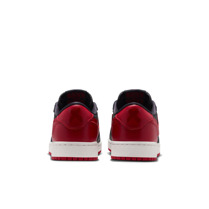 Youth sneaker heel view, red back panel with black collar and white midsole